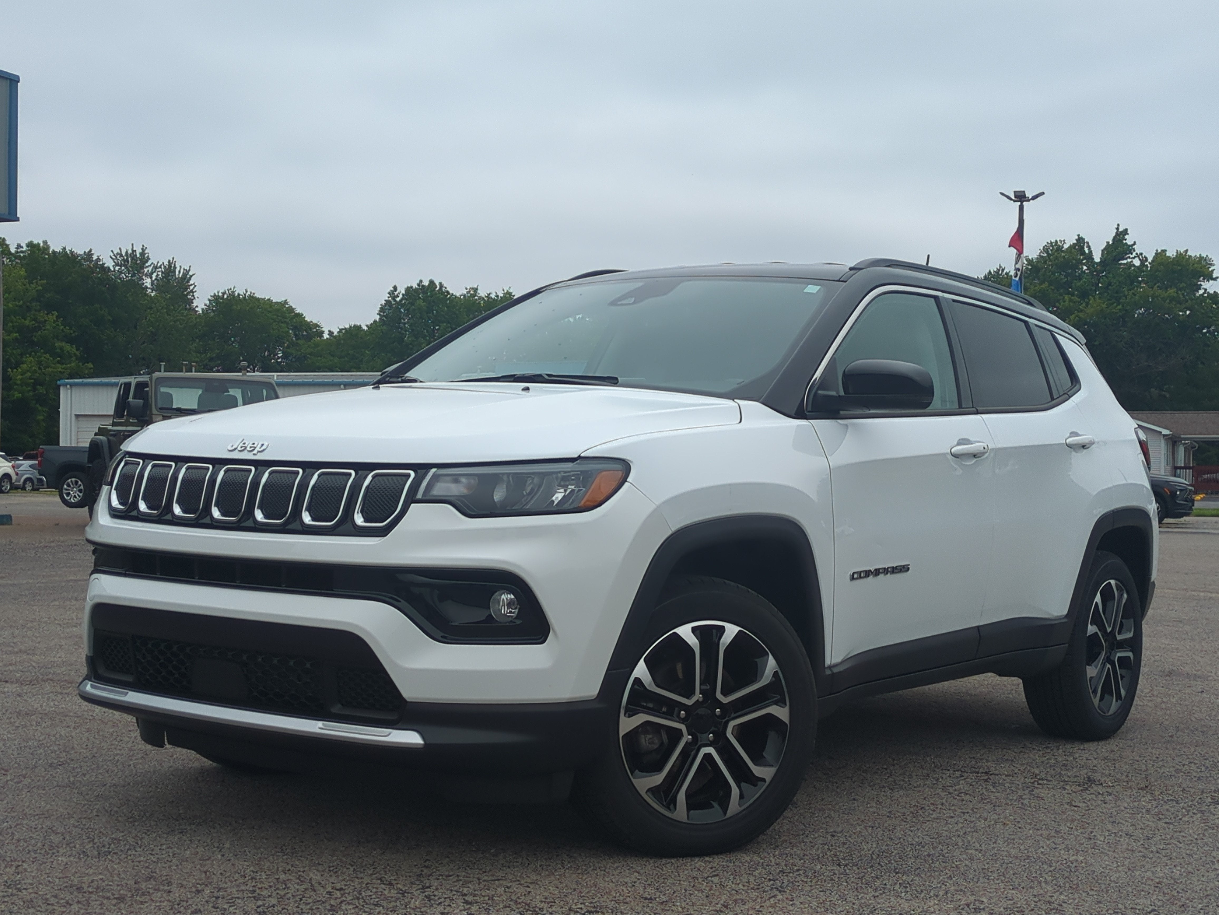 2022 Jeep Compass Limited 4x4 in Bright White Clearcoat — front three-quarter view