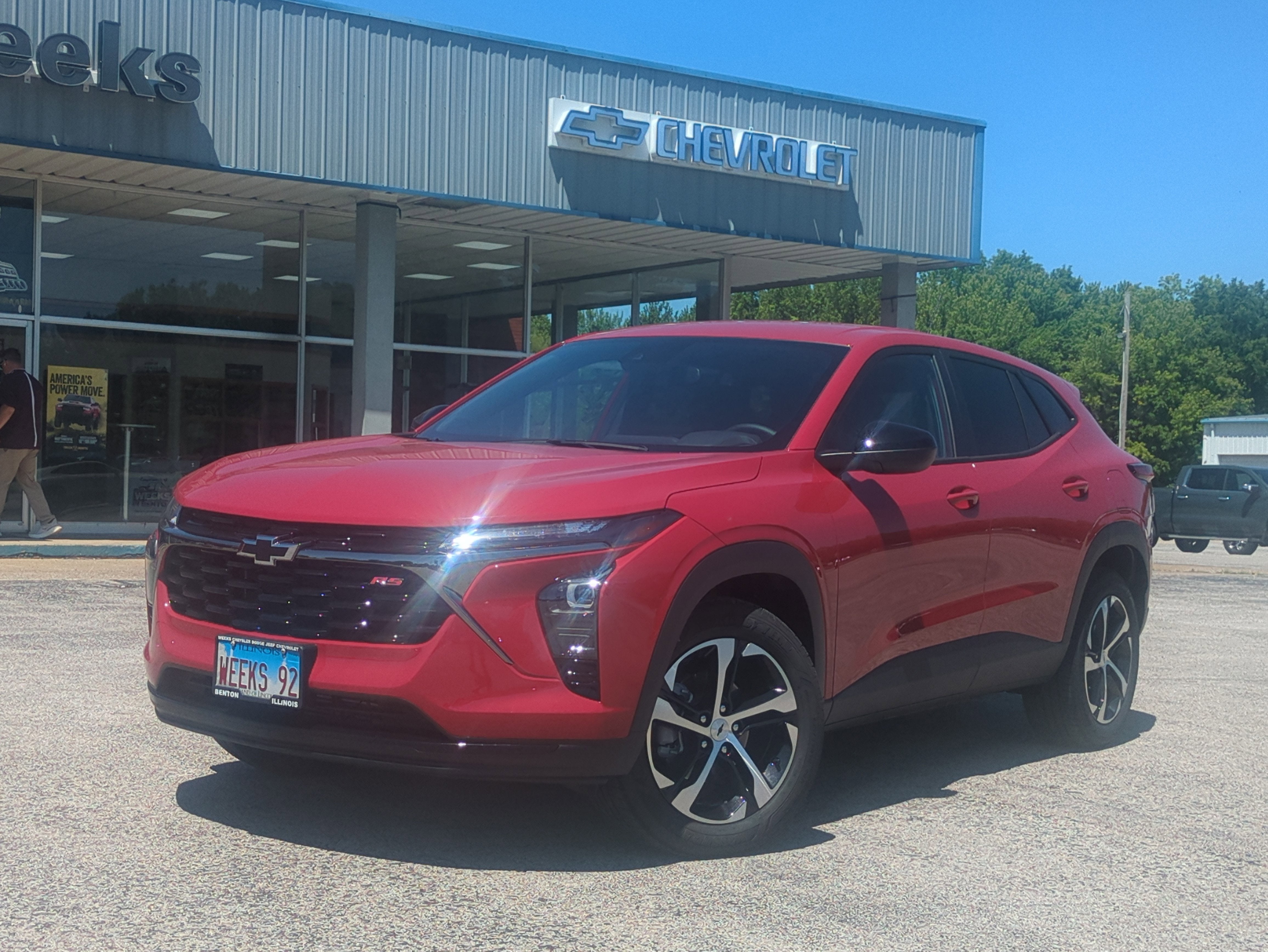 2026 Chevrolet Trax FWD 1RS in Apex Red — front three-quarter view